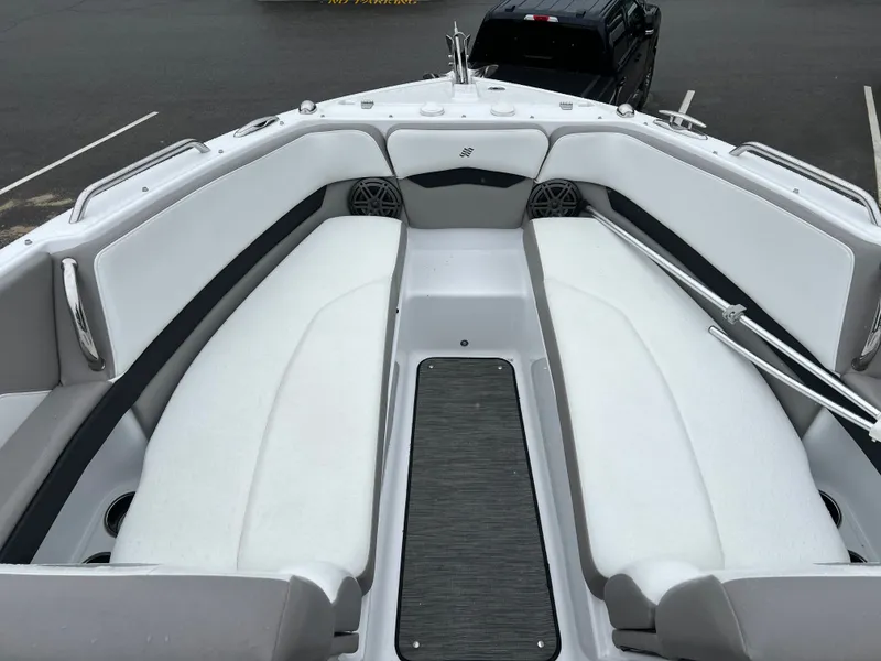 Slide: The Image of Interior view of 2022 Four Winns H260 boat, white upholstery. - 21