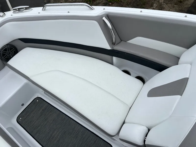 Slide: The Image of Interior of Four Winns H260 boat, 2022 model, featuring white upholstery. - 24