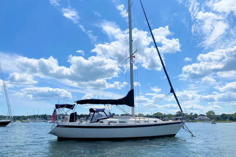 The Image of Sailboat Ericson 38-200, 1993 model, anchored on a sunny day with blue skies. - 0