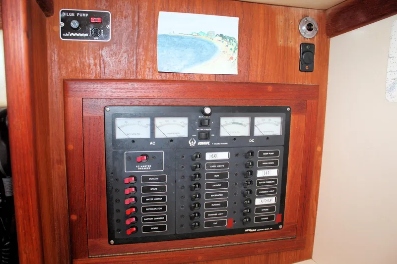 Slide: The Image of Control panel on a 1991 Ericson 380 sailboat with bilge pump switch. - 57