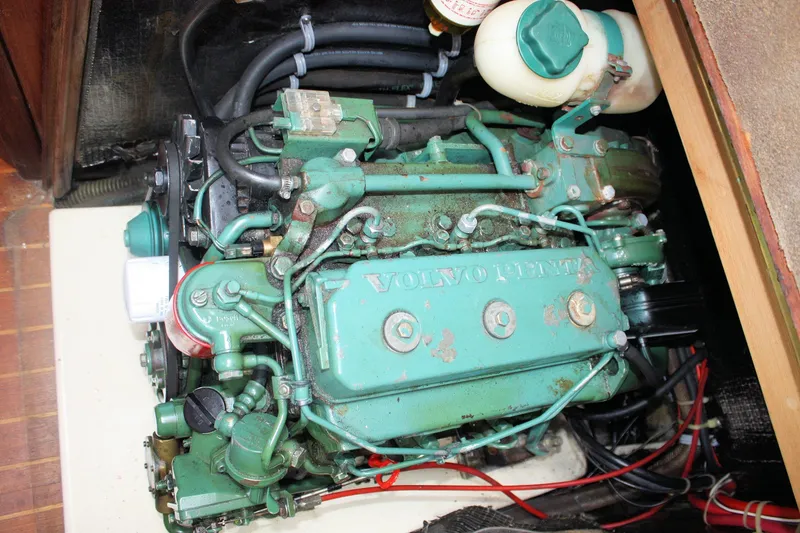 Slide: The Image of Volvo Penta engine in a 1991 Ericson 380 sailboat, showing detailed components and wiring. - 67