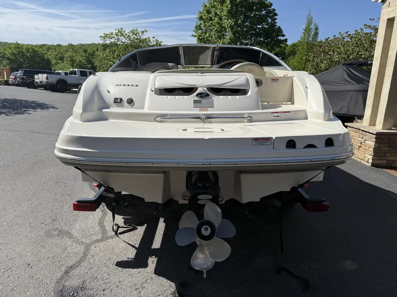 Slide: The Image of Rear view of a 2006 Sea Ray 200 Sundeck boat on a trailer. - 10