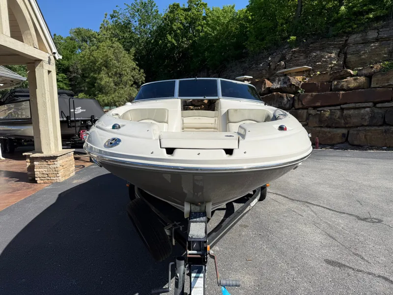 Slide: The Image of 2006 Sea Ray 200 Sundeck boat on trailer, sunny day. - 24