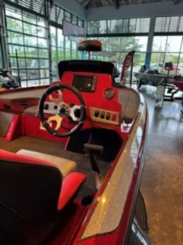 Slide: The Image of Interior view of the 2026 Nitro Z18 boat in showroom. - 2