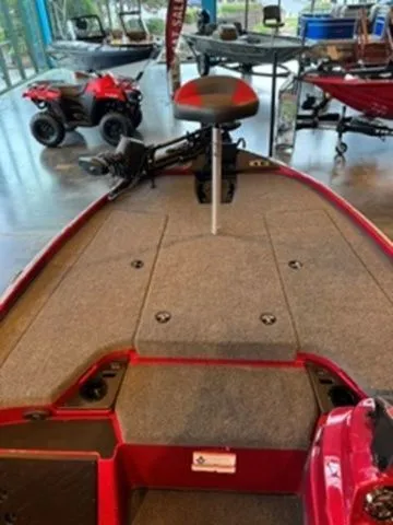 Slide: The Image of 2026 Nitro Z18 boat with red seat and gray deck. - 6