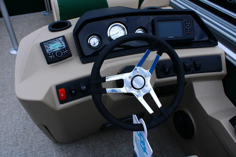 Slide: The Image of Steering console of 2026 Bennington 21 SSRSF boat with gauges and controls. - 2