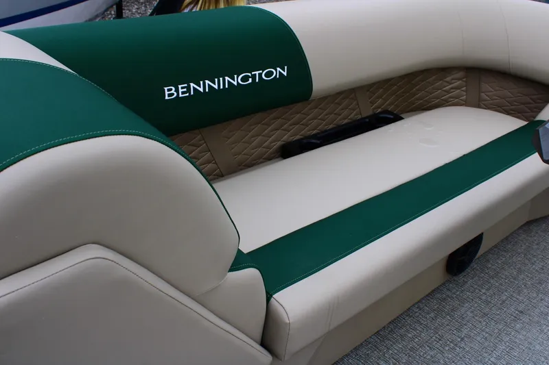 Slide: The Image of Luxurious seating on 2026 Bennington 21 SSRSF boat with green and beige upholstery. - 3