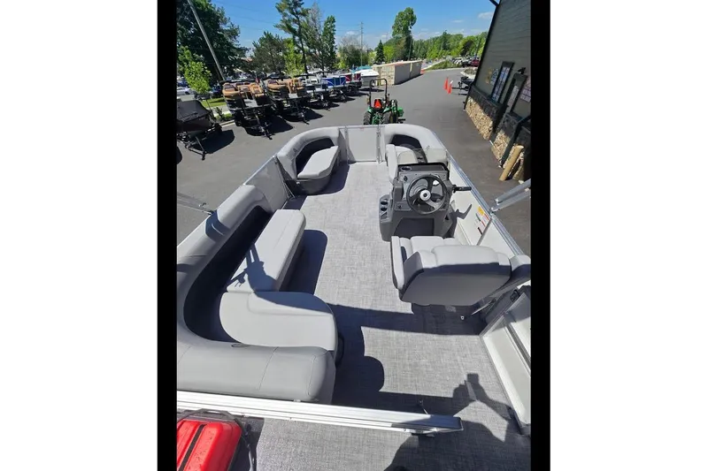 Slide: The Image of 2026 Sun Tracker Party Barge 16 DLX pontoon boat with spacious seating and modern design. - 5