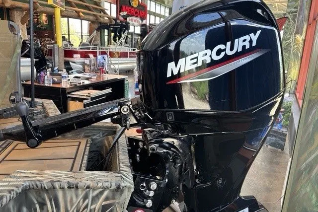 Slide: The Image of Outboard motor on 2026 Tracker Grizzly 1650 T Prairie Wings Edition boat. - 10
