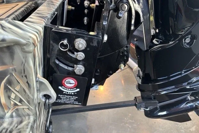 Slide: The Image of 2026 Tracker Grizzly 1650 T Prairie Wings Edition boat motor mount detail. - 8