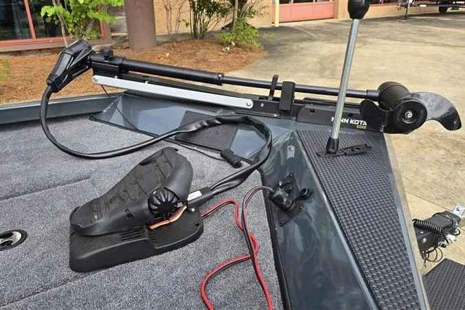 Slide: The Image of 2026 Ranger RT188C boat deck with trolling motor and foot pedal controls. - 8