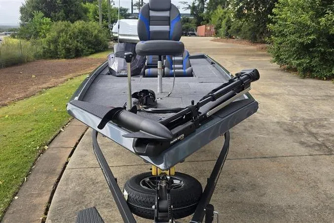 Slide: The Image of 2026 Ranger RT188C fishing boat on trailer, featuring seating and equipment. - 2