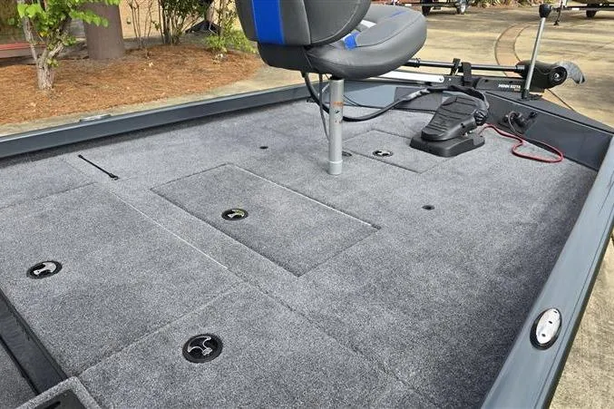 Slide: The Image of 2026 Ranger RT188C boat deck with seating and storage compartments. - 9