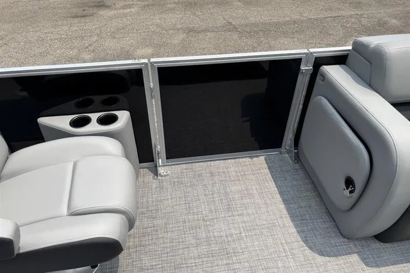 Slide: The Image of 2026 Sun Tracker Party Barge 22 RF XP3 interior with gray seating and cup holders. - 14