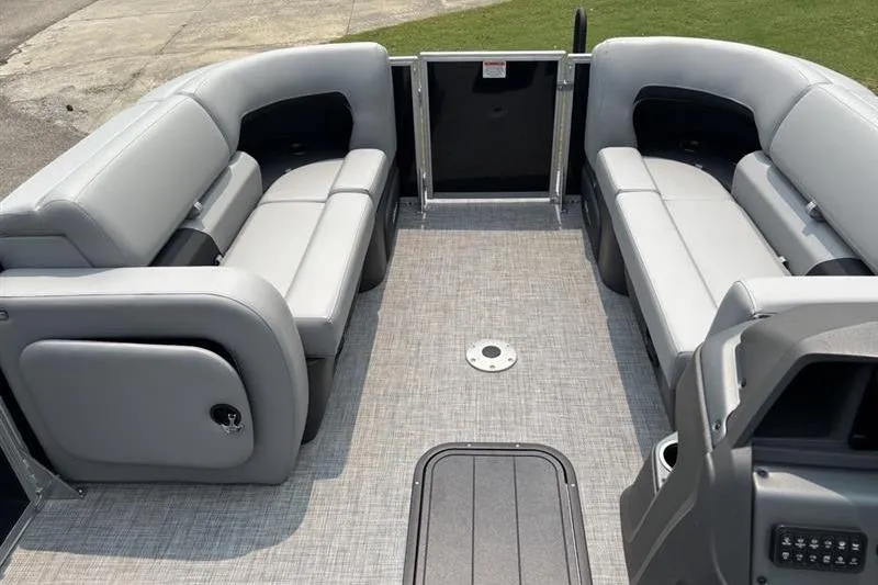 Slide: The Image of 2026 Sun Tracker Party Barge 22 RF XP3 interior with gray seating and spacious layout. - 6