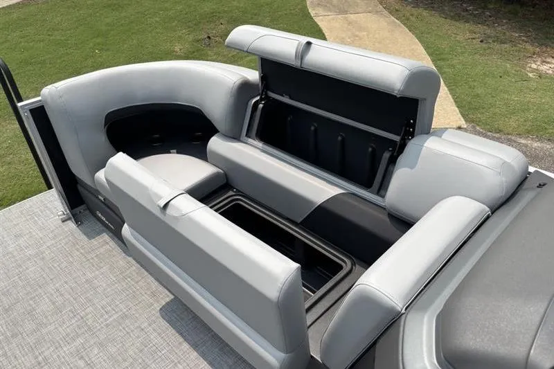 Slide: The Image of 2026 Sun Tracker Party Barge 22 RF XP3 seating with open storage compartments. - 10