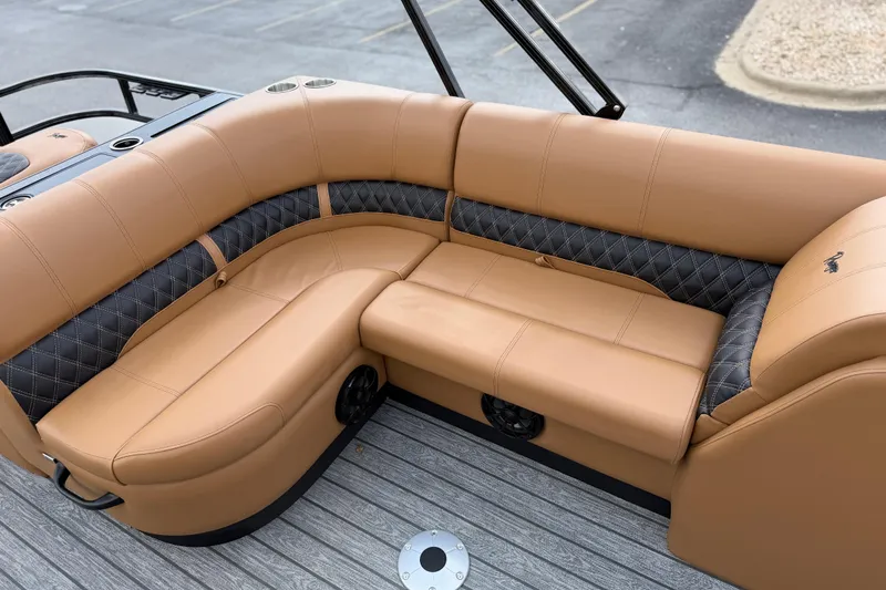 Slide: The Image of Luxurious tan and black seating on 2026 Ranger 223FC boat deck. - 18