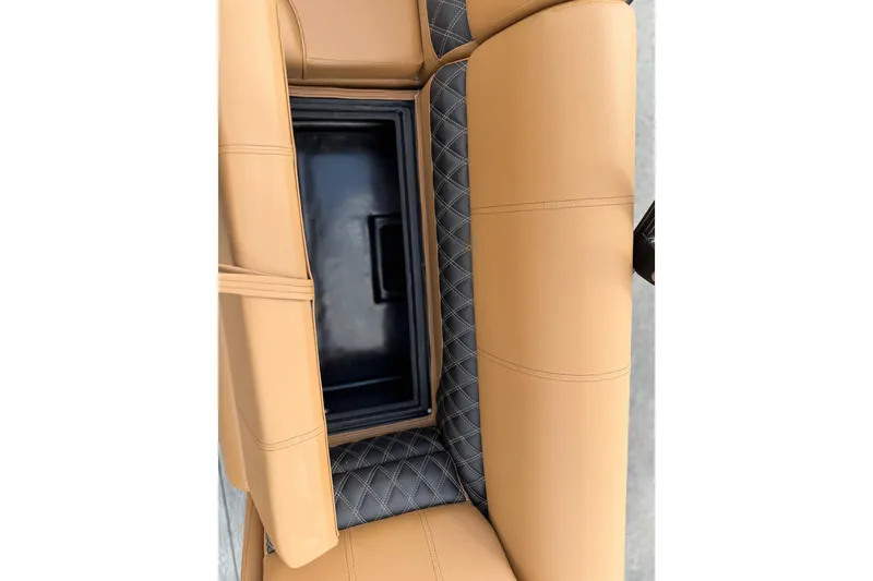 Slide: The Image of Tan and gray leather seating with storage compartment in 2026 Ranger 223FC. - 21