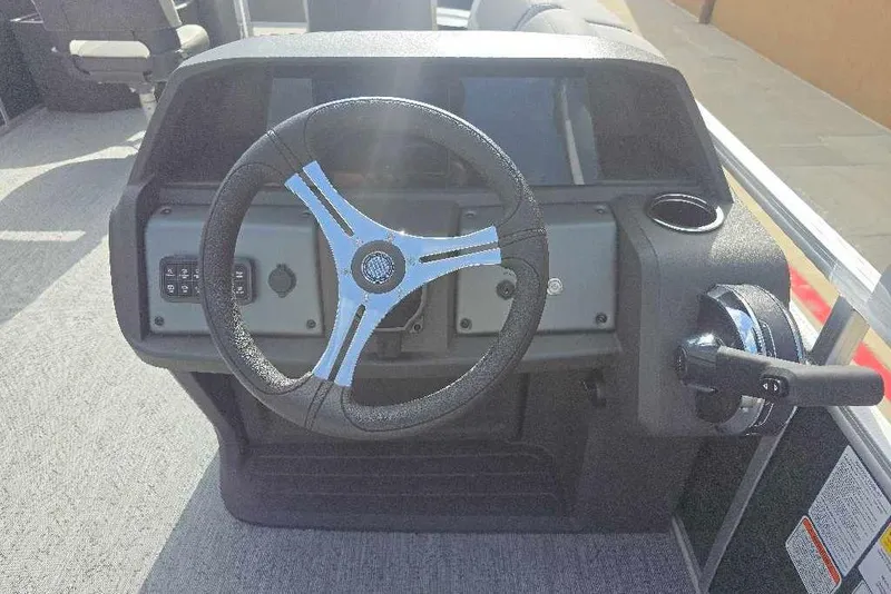 Slide: The Image of Steering console of 2026 Sun Tracker Fishin' Barge 20 DLX pontoon boat. - 19