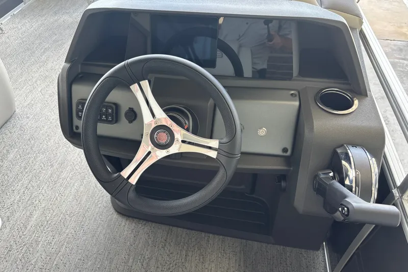 Slide: The Image of Steering console of 2026 Sun Tracker Fishin' Barge 20 DLX pontoon boat. - 20