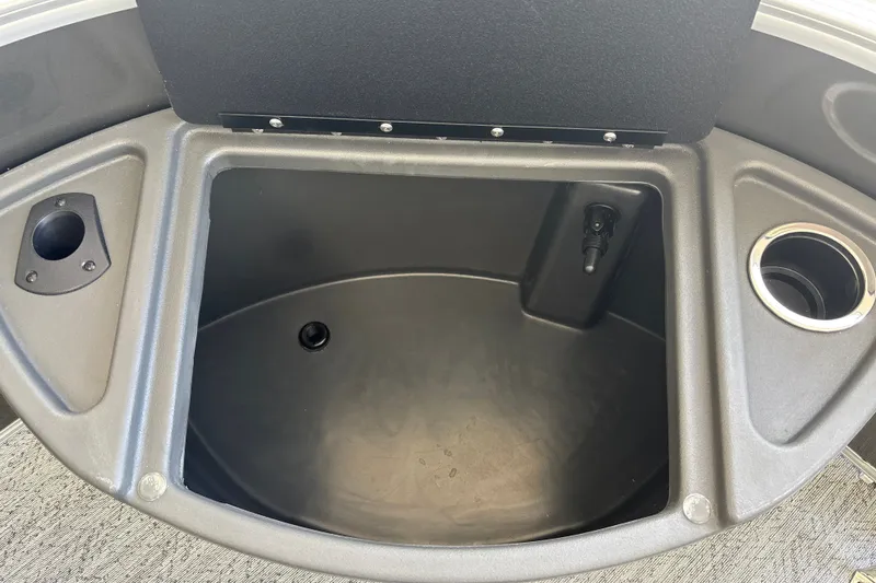 Slide: The Image of 2026 Sun Tracker Fishin' Barge 20 DLX livewell with cup holder and rod holder. - 34