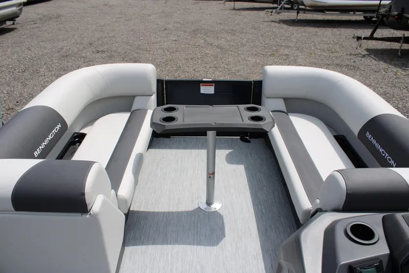 Slide: The Image of 2026 Bennington 22 SSRSF pontoon boat interior with seating and table. - 10