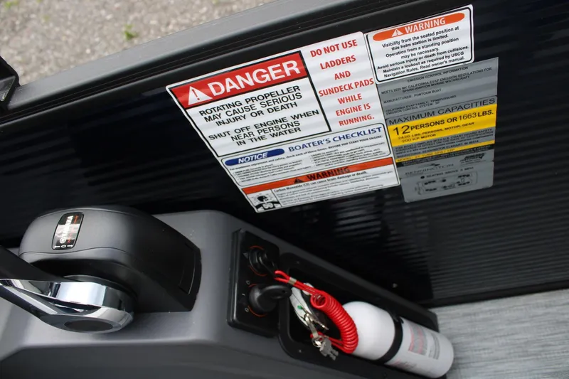 Slide: The Image of Safety warnings and controls on a 2026 Bennington 22 SSRSF boat. - 13