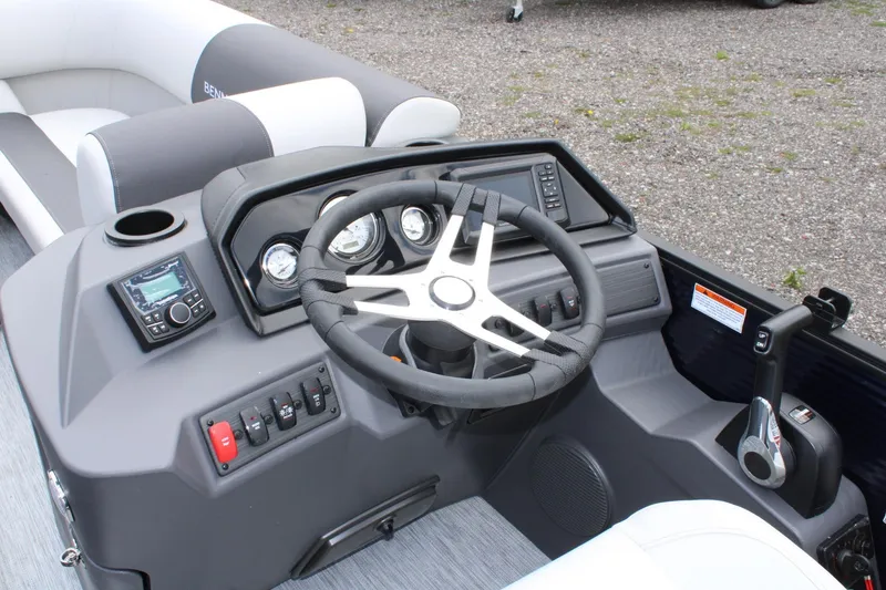 Slide: The Image of 2026 Bennington 22 SSRSF boat dashboard with steering wheel and control panel. - 8