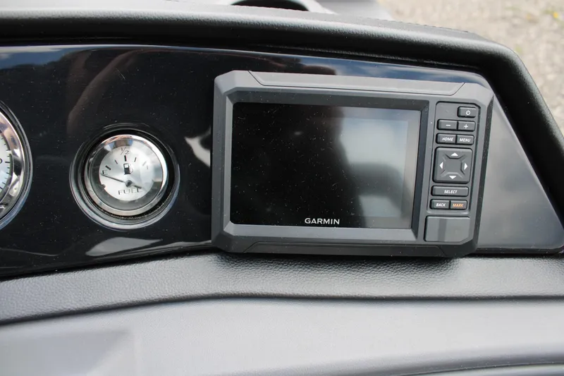 Slide: The Image of Dashboard of 2026 Bennington 22 SSRSF with Garmin display and fuel gauge. - 9