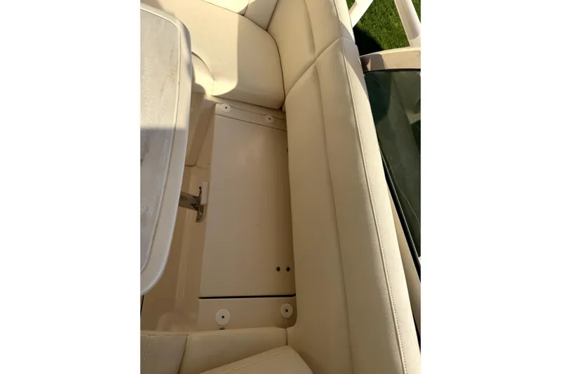 Slide: The Image of 2017 Grady White Freedom 335 boat interior seating and storage compartment. - 11