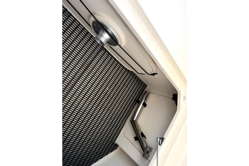Slide: The Image of Storage compartment of 2017 Grady White Freedom 335 boat, featuring organized interior space. - 18