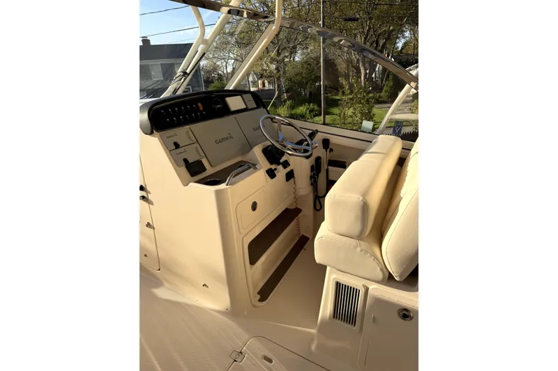 Slide: The Image of 2017 Grady White Freedom 335 boat helm with Garmin navigation system. - 8