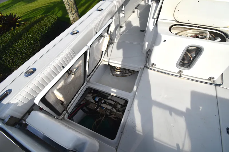 Slide: The Image of 2007 Glacier Bay 3065 Canyon Runner boat deck with open storage compartments. - 23