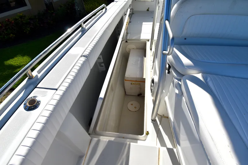 Slide: The Image of 2007 Glacier Bay 3065 Canyon Runner boat interior with storage compartment and seating. - 30