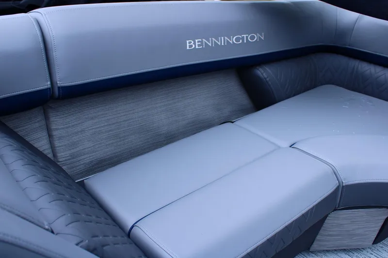 Slide: The Image of Luxurious seating in 2026 Bennington 24 MFBSF boat, featuring elegant gray upholstery. - 3