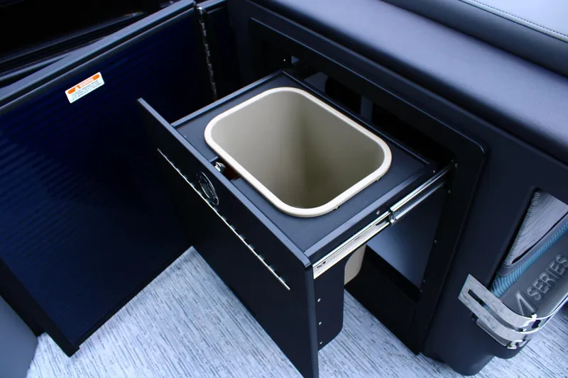 Slide: The Image of Built-in trash compartment on 2026 Bennington 24 MFBSF boat, featuring sleek design and functionality. - 6