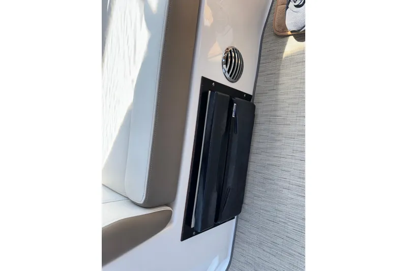 Slide: The Image of 2017 Regal 28 Express interior detail with seating and vent. - 25