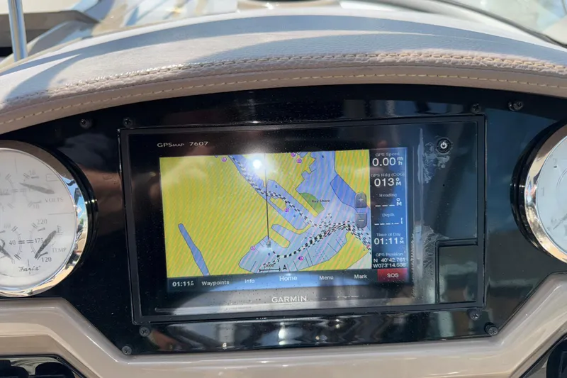 Slide: The Image of Dashboard of a 2017 Regal 28 Express boat with Garmin GPS display. - 33
