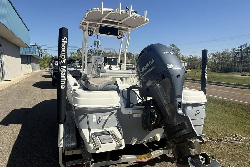 Slide: The Image of 2023 NauticStar 211 Hybrid boat with Yamaha 150 engine at Shoup's Marine dealership. - 10