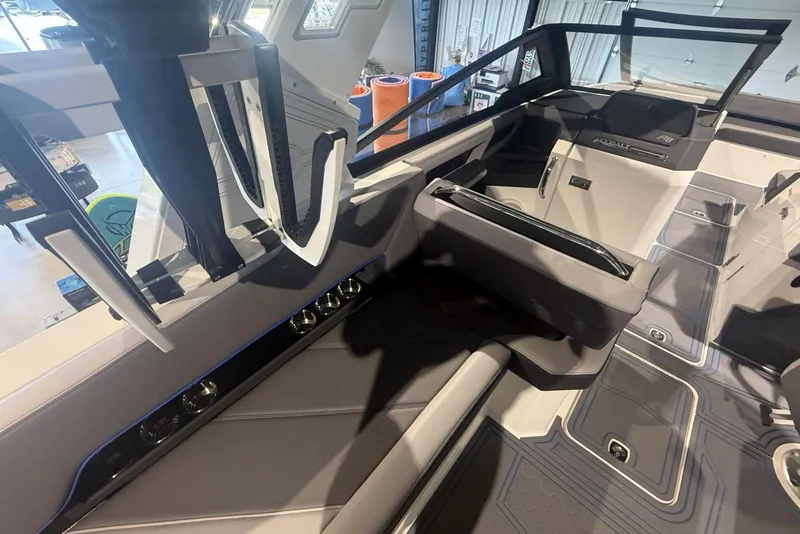 Slide: The Image of Interior of 2024 Cobalt R8 Surf boat, featuring sleek seating and modern design elements. - 10