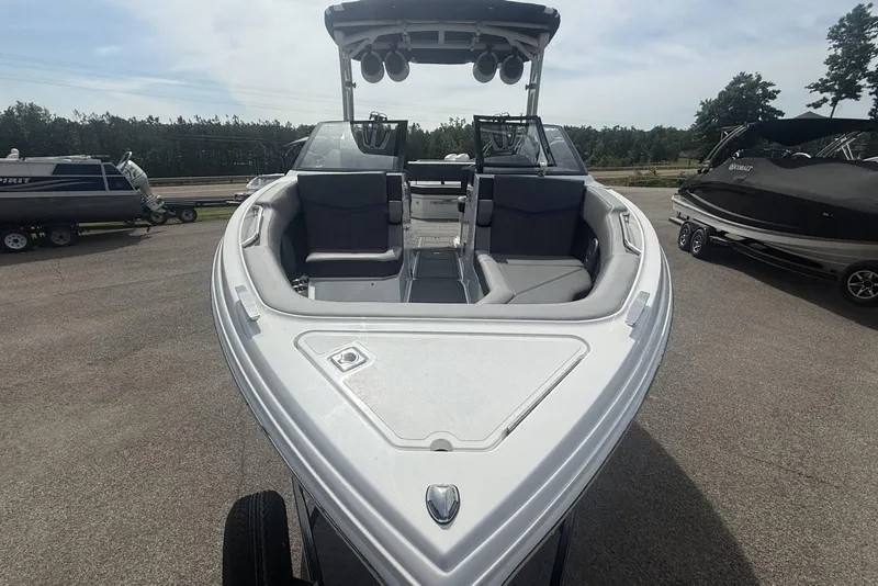 Slide: The Image of 2024 Cobalt R8 Surf boat with sleek design and spacious seating. - 17