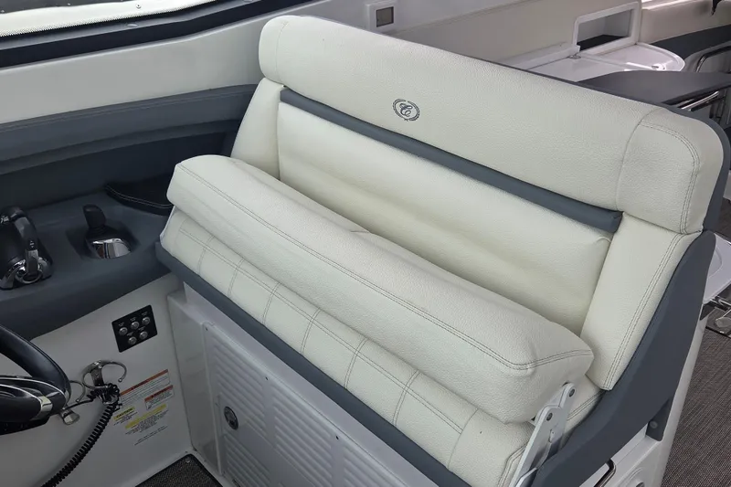 Slide: The Image of Luxurious interior seating of 2017 Cobalt A40 Coupe boat, featuring plush white upholstery. - 14