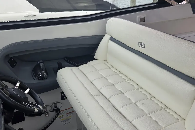 Slide: The Image of Interior of 2017 Cobalt A40 Coupe with white leather seating and steering controls. - 15