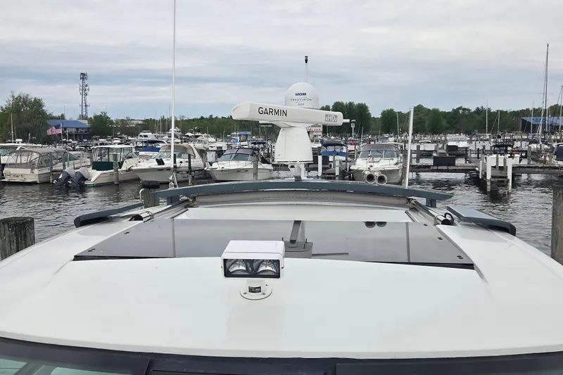 Slide: The Image of 2017 Cobalt A40 Coupe docked at a marina with Garmin radar equipment. - 20