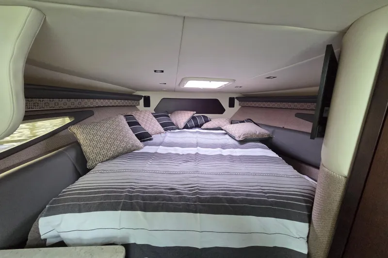 Slide: The Image of Interior cabin of 2017 Cobalt A40 Coupe with cozy bedding and pillows. - 28