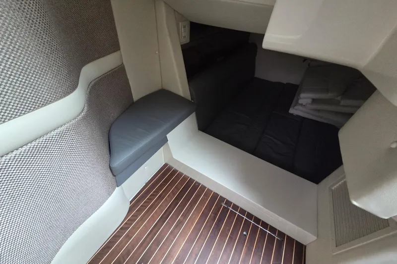 Slide: The Image of Interior cabin of 2017 Cobalt A40 Coupe with wood flooring and cushioned seating. - 30