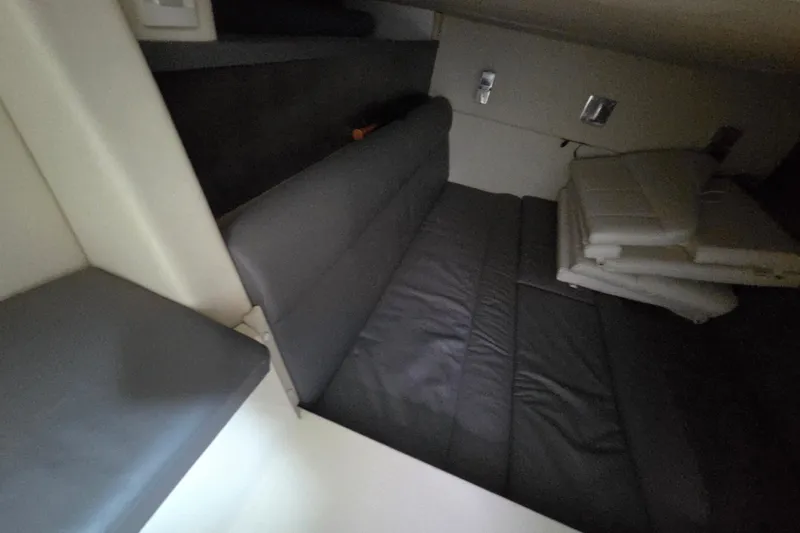 Slide: The Image of Interior cabin of 2017 Cobalt A40 Coupe with gray seating and cushions. - 31