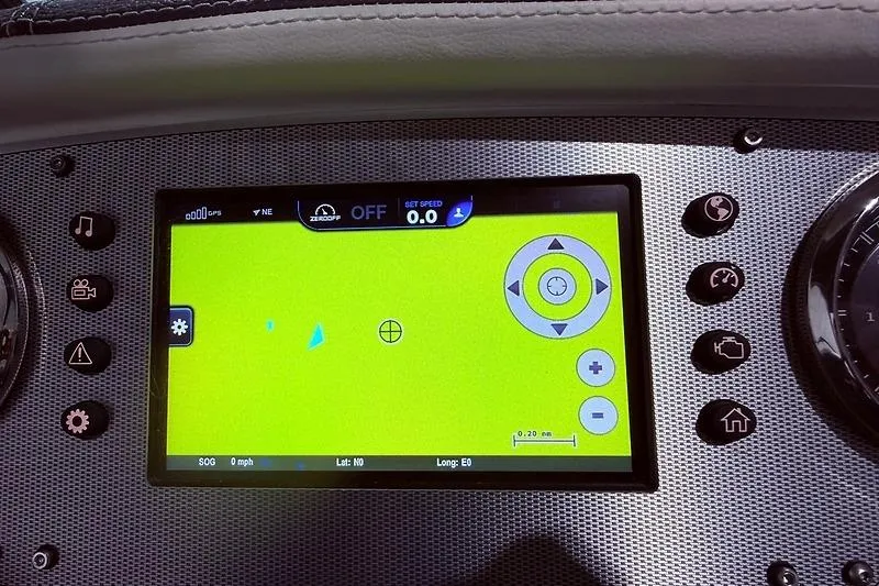 Slide: The Image of Dashboard of a 2016 Regal 24 FasDeck RX boat with navigation display. - 21