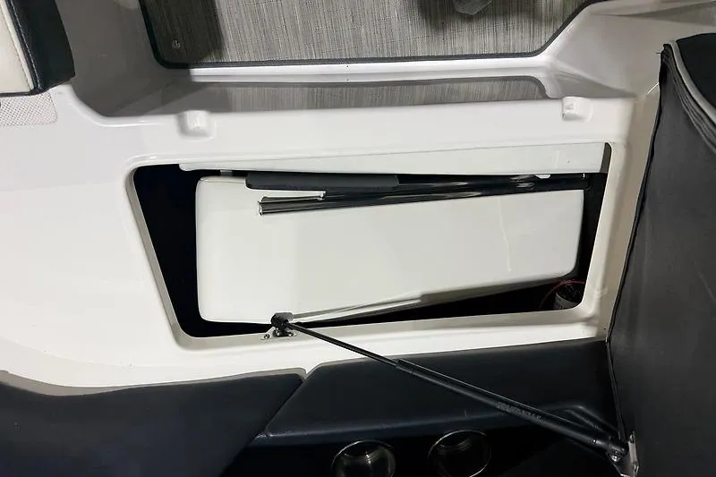 Slide: The Image of Storage compartment in a 2016 Regal 24 FasDeck RX boat interior. - 29