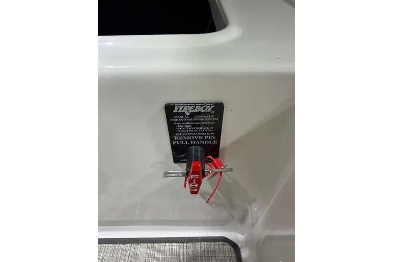 Slide: The Image of Fireboy fire extinguisher system on 2016 Regal 24 FasDeck RX boat. - 31